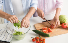 Cropped picture of mature loving couple family cooking.