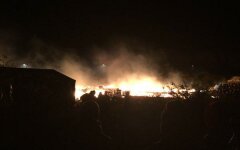 Пожар в лагере беженцев в Кале