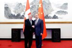 Ван Ї та Ларс Люкке Расмуссен
