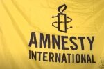 Amnesty International, Романенко