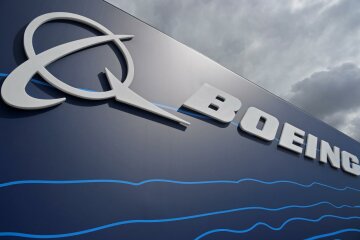 Signage for Boeing is seen on a trade pavilion at Farnborough International Airshow in Farnborough, Britain