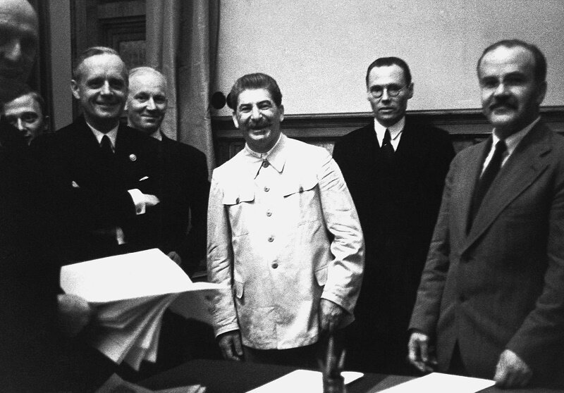 Stalin, von Ribbentrop, and Molotov at the Signing of the Soviet-German Non-Agression Pact