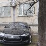 Зарядка электромобиля из окна квартиры