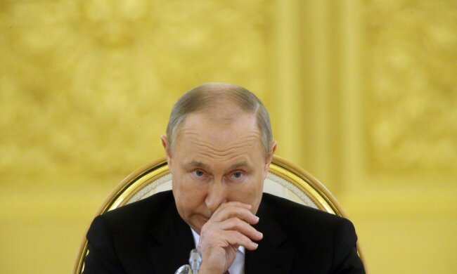 Путін