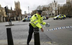 Police tapes off Parliament Square after reports of loud bangs, in London