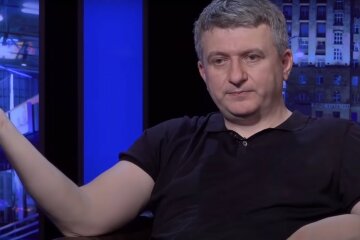 Юрий Романенко,Михаил Саакашвили,налог на выведенный капитал,эмиссия гривны