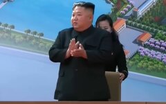 глава КНДР Кым Чен Ын, Владимир Путин, медаль