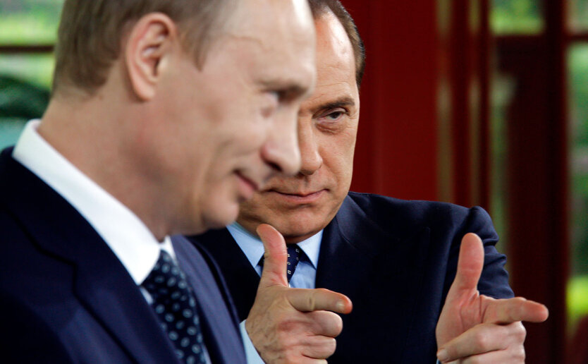 Володимир Путін та Сільвіо Берлусконі / Фото: Alessandro Bianchi / Reuters