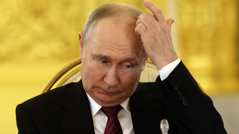 Путін