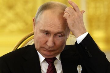 Путин