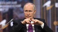 Путін