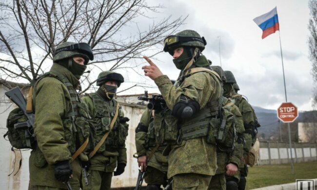 Российские оккупанты, белые повязки, вторжение РФ в Украину
