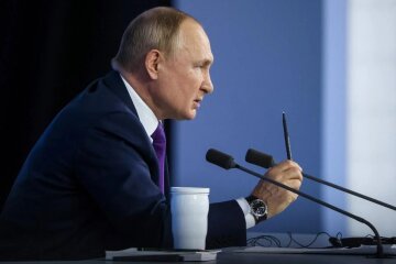 Путін