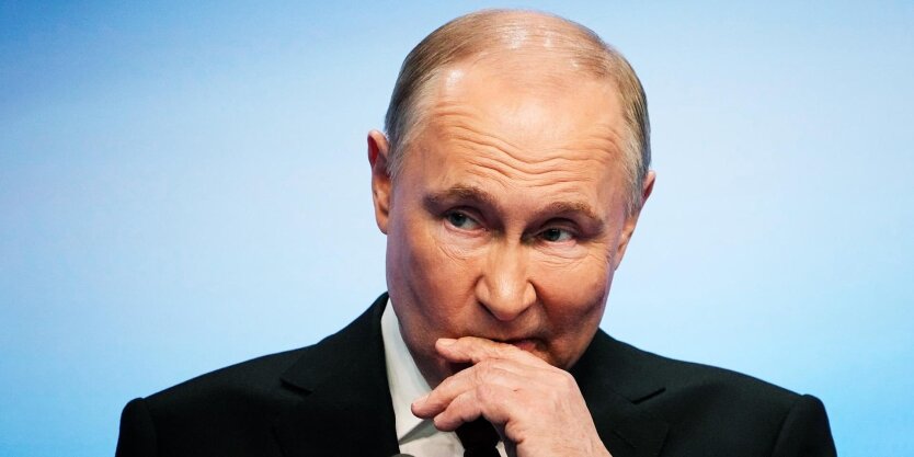Путін