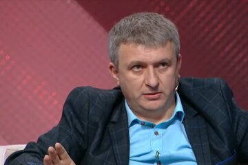 политолог Юрий Романенко