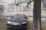Зарядка электромобиля из окна квартиры
