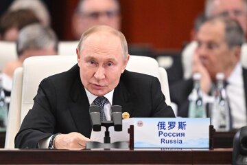 Путін