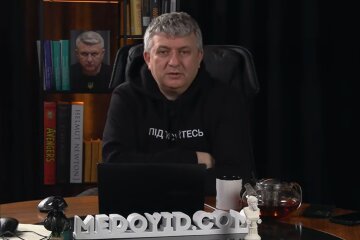 Юрий Романенко