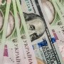 Гривні та долари