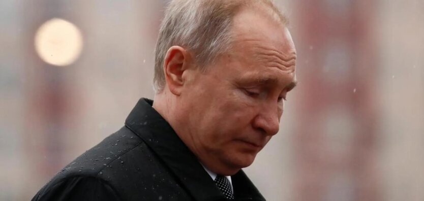 Путин